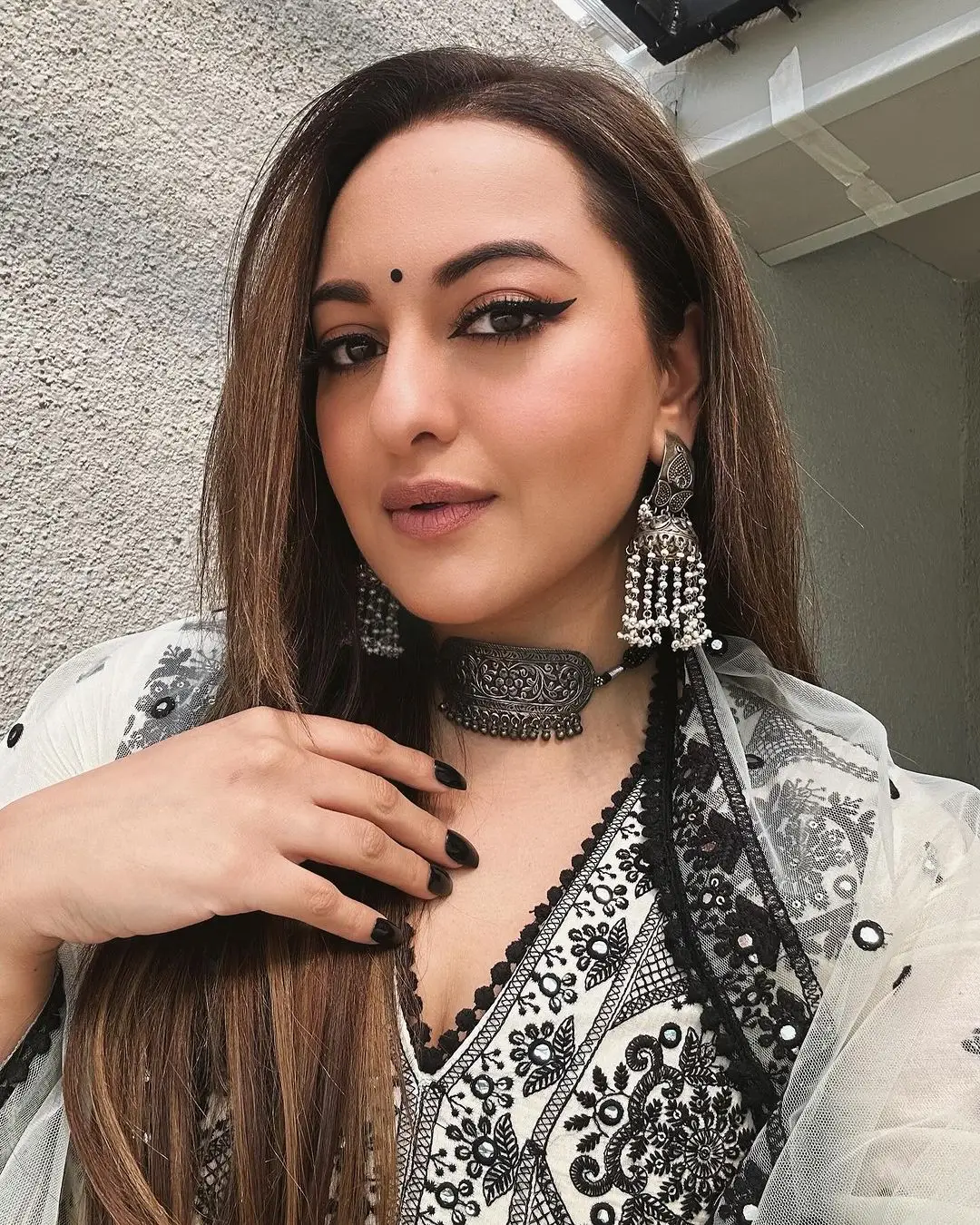 Mumbai Actress Sonakshi Sinha Long Hair Photoshoot in Black Dress